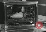 Image of model futuristic kitchen United States USA, 1950, second 29 stock footage video 65675023859
