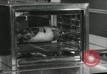 Image of model futuristic kitchen United States USA, 1950, second 31 stock footage video 65675023859