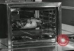 Image of model futuristic kitchen United States USA, 1950, second 32 stock footage video 65675023859