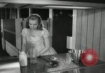 Image of model futuristic kitchen United States USA, 1950, second 57 stock footage video 65675023859