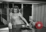 Image of model futuristic kitchen United States USA, 1950, second 59 stock footage video 65675023859