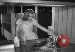 Image of model futuristic kitchen United States USA, 1950, second 62 stock footage video 65675023859