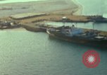 Standbild Docks Khanh Hoa Vietnam, 1970, aus Sekunde 21 historischem Filmmaterial Videoclip 65675023879