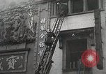 Standbild Treasury Building brennen auf der Nanking Road Shanghai China, 1932, aus Sekunde 52 historischem Filmmaterial Videoclip 65675023914