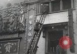 Standbild Treasury Building brennen auf der Nanking Road Shanghai China, 1932, aus Sekunde 53 historischem Filmmaterial Videoclip 65675023914