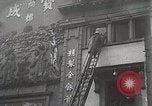 Standbild Treasury Building brennen auf der Nanking Road Shanghai China, 1932, aus Sekunde 60 historischem Filmmaterial Videoclip 65675023914