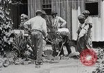 Image Negro students learning de semer des plantes et construire une remise Alabama United States USA, 1921, de la seconde 6 séquences d'archives historiques vidéo 65675023995