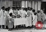 Image Negro students learning de semer des plantes et construire une remise Alabama United States USA, 1921, de la seconde 41 séquences d'archives historiques vidéo 65675023995