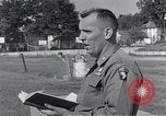 Image of Catholic Mass Little Rock Arkansas USA, 1957, second 37 stock footage video 65675024024