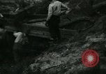 Image of Ford  M1918  tank gets stuck during testing Dearborn Michigan USA, 1918, second 50 stock footage video 65675024112