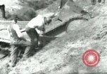 Image of Ford  M1918  tank gets stuck during testing Dearborn Michigan USA, 1918, second 59 stock footage video 65675024112