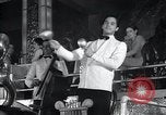 Image of Guillermo Portela conducting orchestra Havana Cuba, 1938, second 50 stock footage video 65675024199