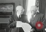 Image of Eisenhower and Dulles in White House Washington DC USA, 1955, second 3 stock footage video 65675024226