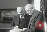 Image of Eisenhower and Dulles in White House Washington DC USA, 1955, second 14 stock footage video 65675024226