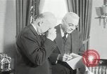 Image of Eisenhower and Dulles in White House Washington DC USA, 1955, second 16 stock footage video 65675024226