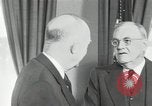 Image of Eisenhower and Dulles in White House Washington DC USA, 1955, second 32 stock footage video 65675024226
