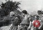 Image of German soldiers surrendering as U.S. Army advances through Belgium France, 1944, second 38 stock footage video 65675024438