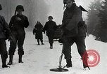 Image of American Troops use mine detectors in snow Germany, 1944, second 7 stock footage video 65675024444