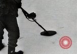 Image of American Troops use mine detectors in snow Germany, 1944, second 16 stock footage video 65675024444