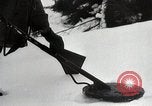 Image of American Troops use mine detectors in snow Germany, 1944, second 18 stock footage video 65675024444