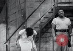 Image of USIS sponsoring Owens, Falkner, a trade show, and Porgy and Bess. United States USA, 1956, second 16 stock footage video 65675024538