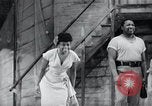Image of USIS sponsoring Owens, Falkner, a trade show, and Porgy and Bess. United States USA, 1956, second 17 stock footage video 65675024538