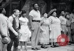 Image of USIS sponsoring Owens, Falkner, a trade show, and Porgy and Bess. United States USA, 1956, second 22 stock footage video 65675024538