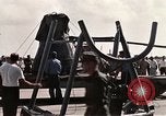 Image of Aurora 7 space capsule placed aboard a C-124 aircraft Ceiba Puerto Rico, 1962, second 6 stock footage video 65675024557