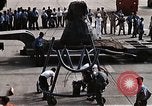 Image of Aurora 7 space capsule placed aboard a C-124 aircraft Ceiba Puerto Rico, 1962, second 12 stock footage video 65675024557