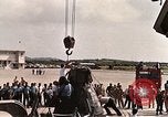 Image of Aurora 7 space capsule placed aboard a C-124 aircraft Ceiba Puerto Rico, 1962, second 17 stock footage video 65675024557
