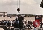 Image of Aurora 7 space capsule placed aboard a C-124 aircraft Ceiba Puerto Rico, 1962, second 18 stock footage video 65675024557