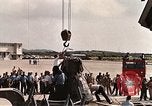 Image of Aurora 7 space capsule placed aboard a C-124 aircraft Ceiba Puerto Rico, 1962, second 19 stock footage video 65675024557