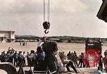 Image of Aurora 7 space capsule placed aboard a C-124 aircraft Ceiba Puerto Rico, 1962, second 20 stock footage video 65675024557