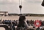 Image of Aurora 7 space capsule placed aboard a C-124 aircraft Ceiba Puerto Rico, 1962, second 26 stock footage video 65675024557