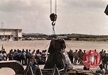 Image of Aurora 7 space capsule placed aboard a C-124 aircraft Ceiba Puerto Rico, 1962, second 27 stock footage video 65675024557
