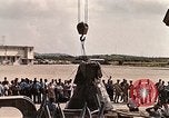 Image of Aurora 7 space capsule placed aboard a C-124 aircraft Ceiba Puerto Rico, 1962, second 28 stock footage video 65675024557