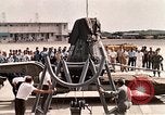 Image of Aurora 7 space capsule placed aboard a C-124 aircraft Ceiba Puerto Rico, 1962, second 45 stock footage video 65675024557