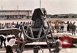 Image of Aurora 7 space capsule placed aboard a C-124 aircraft Ceiba Puerto Rico, 1962, second 46 stock footage video 65675024557