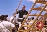 Image of astronauts and their departure Grand Turk Island, 1962, second 51 stock footage video 65675024579