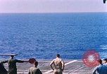 Standbild US Marine Corps UH 34D Hubschrauber landet auf Deck Cape Canaveral Florida USA, 1962, aus Sekunde 11 historischem Filmmaterial Videoclip 65675024593
