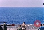 Standbild US Marine Corps UH 34D Hubschrauber landet auf Deck Cape Canaveral Florida USA, 1962, aus Sekunde 13 historischem Filmmaterial Videoclip 65675024593