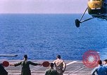 Standbild US Marine Corps UH 34D Hubschrauber landet auf Deck Cape Canaveral Florida USA, 1962, aus Sekunde 18 historischem Filmmaterial Videoclip 65675024593