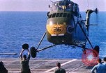 Standbild US Marine Corps UH 34D Hubschrauber landet auf Deck Cape Canaveral Florida USA, 1962, aus Sekunde 26 historischem Filmmaterial Videoclip 65675024593