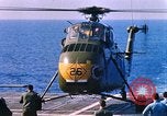Standbild US Marine Corps UH 34D Hubschrauber landet auf Deck Cape Canaveral Florida USA, 1962, aus Sekunde 30 historischem Filmmaterial Videoclip 65675024593