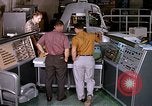 Image of astronauts in procedure trainer United States USA, 1960, second 23 stock footage video 65675024626