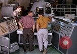Image of astronauts in procedure trainer United States USA, 1960, second 24 stock footage video 65675024626