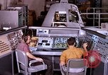 Image of astronauts in procedure trainer United States USA, 1960, second 37 stock footage video 65675024626