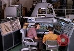 Image of astronauts in procedure trainer United States USA, 1960, second 58 stock footage video 65675024626
