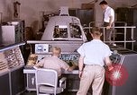 Image of astronauts in procedure trainer United States USA, 1960, second 31 stock footage video 65675024628