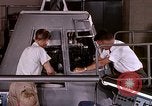 Image of astronauts in procedure trainer United States USA, 1960, second 52 stock footage video 65675024628